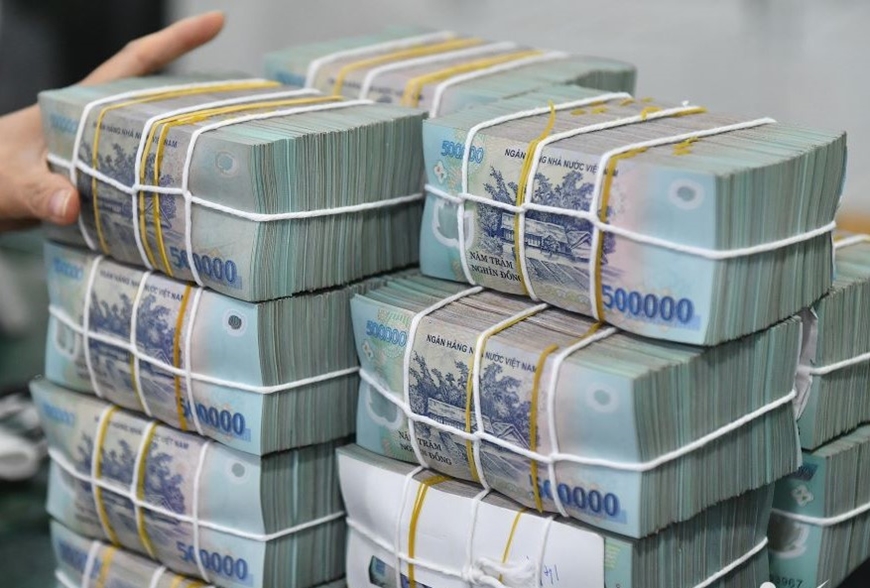 Đổi tiền mới "cắt" phí sẽ bị xử lý ra sao?- Ảnh 1. Đổi tiền mới "cắt" phí sẽ bị xử lý ra sao?- Ảnh 1.